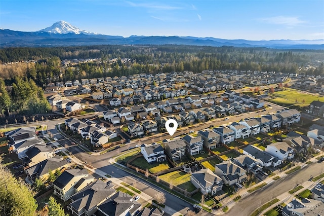 drone / aerial view featuring a mountain view