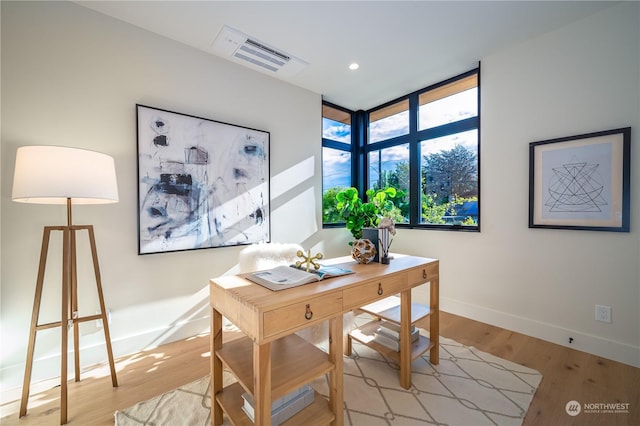 office space featuring light hardwood / wood-style floors