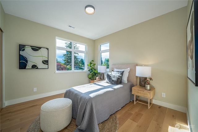 bedroom featuring light hardwood / wood-style floors