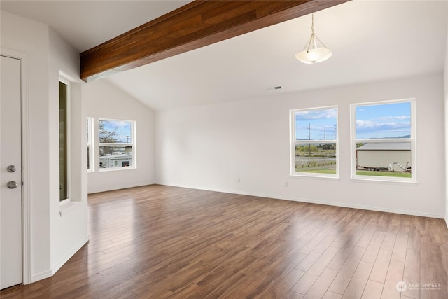 unfurnished living room featuring lofted ceiling with beams and dark hardwood / wood-style floors