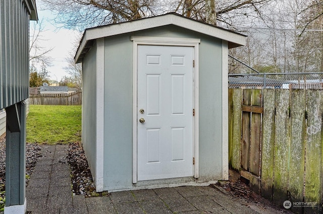 view of outdoor structure featuring a yard