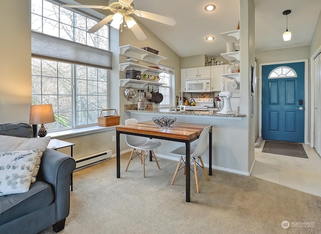 carpeted home office with a baseboard heating unit, ceiling fan, and lofted ceiling