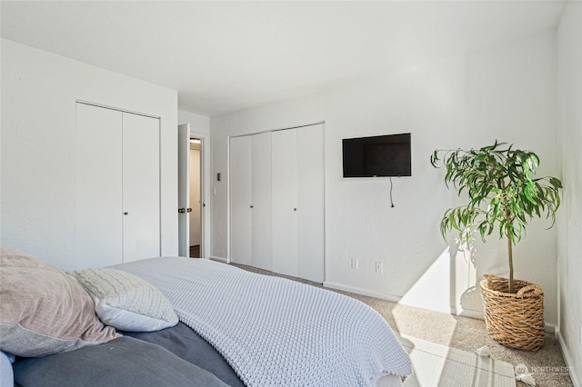 bedroom featuring light carpet