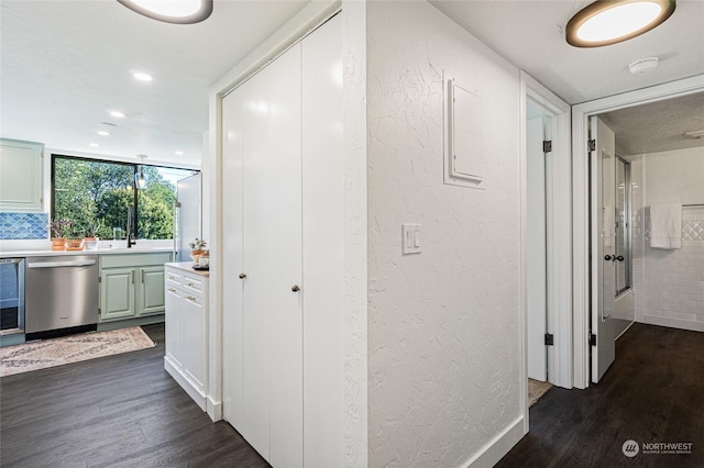 hallway with dark wood-type flooring