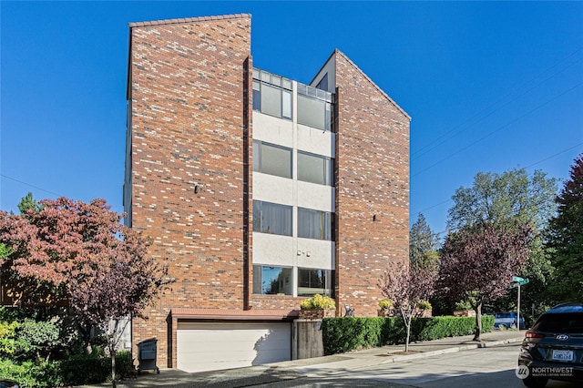 view of building exterior featuring a garage