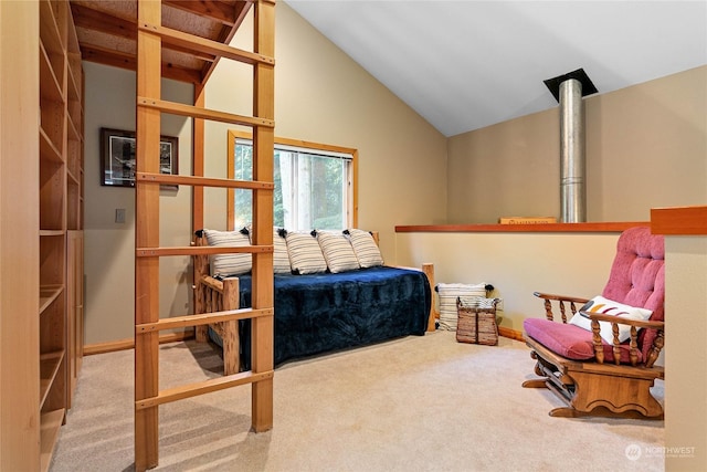 bedroom featuring vaulted ceiling and carpet flooring