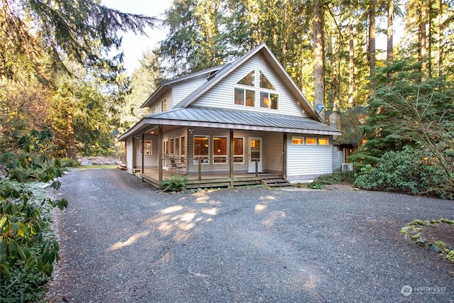 farmhouse featuring covered porch