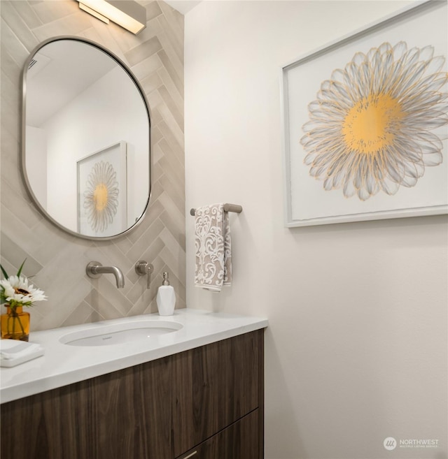 bathroom with backsplash and vanity