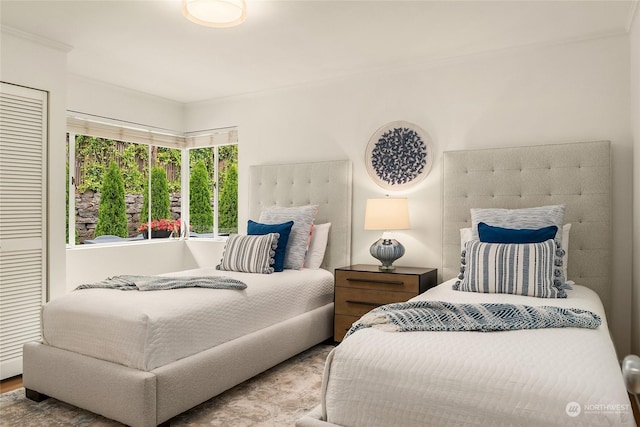 bedroom featuring ornamental molding