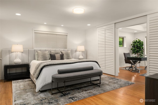 bedroom with wood-type flooring