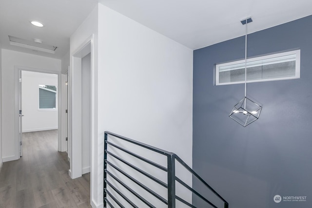 corridor featuring light hardwood / wood-style floors