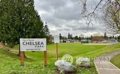 view of community featuring a yard