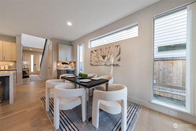 dining room featuring light hardwood / wood-style flooring