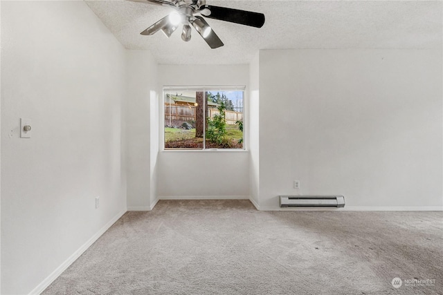 unfurnished room with baseboard heating, ceiling fan, carpet floors, and a textured ceiling