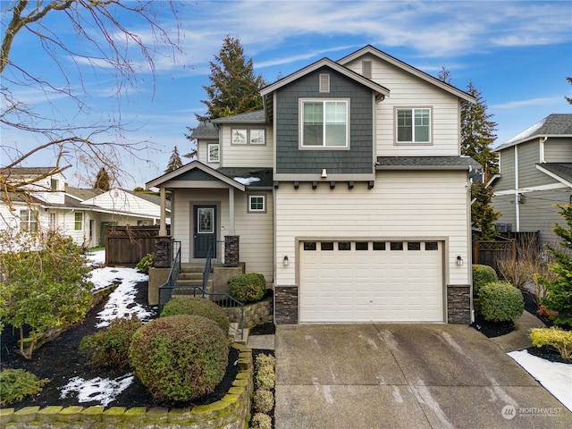 view of front of home with a garage