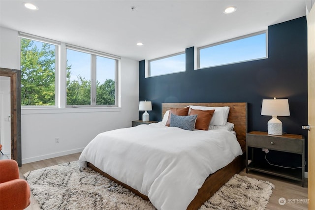 bedroom featuring light wood-type flooring