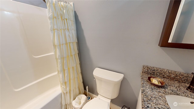 full bathroom with vanity, shower / bathtub combination with curtain, and toilet