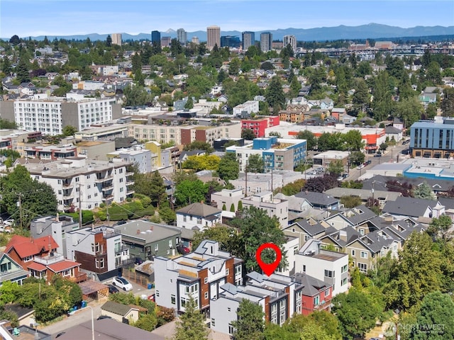 aerial view featuring a mountain view and a city view