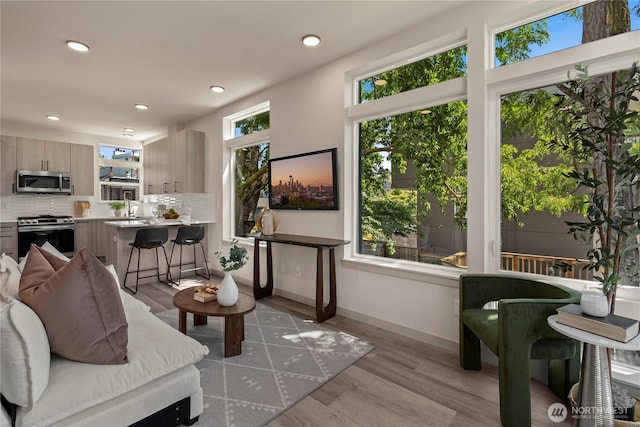 922B N 35th St, Seattle, WA 98103 - living area featuring wood finished floors and recessed lighting