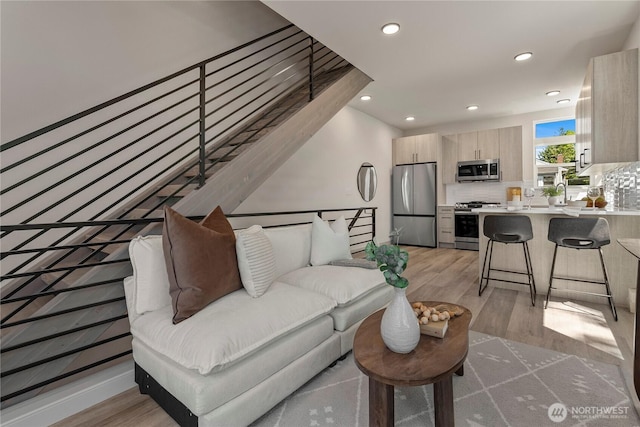 922B N 35th St, Seattle, WA 98103 - living room with light wood-style flooring and recessed lighting