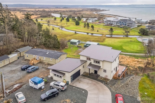 drone / aerial view with a water view