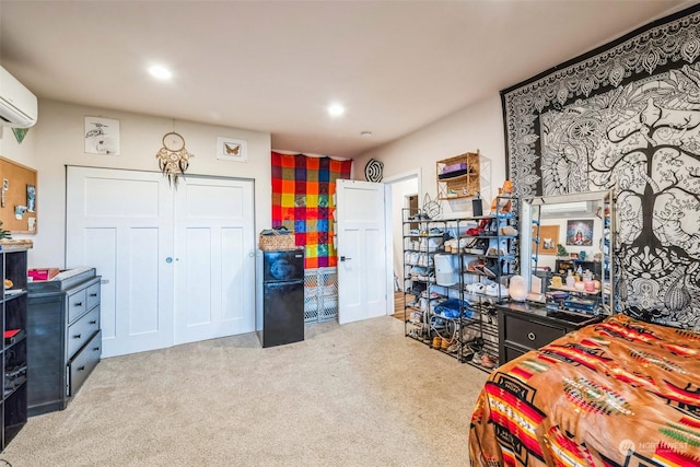 carpeted bedroom with a wall mounted air conditioner