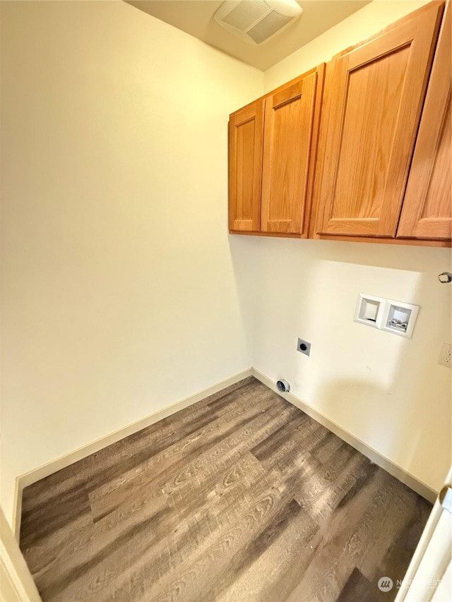 laundry area featuring hardwood / wood-style flooring, electric dryer hookup, cabinets, and hookup for a washing machine