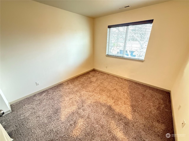 empty room featuring carpet