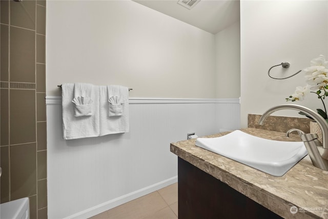 bathroom with tile patterned floors and sink