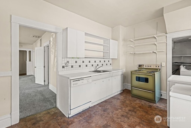 kitchen with electric range, dishwasher, sink, white cabinets, and dark carpet