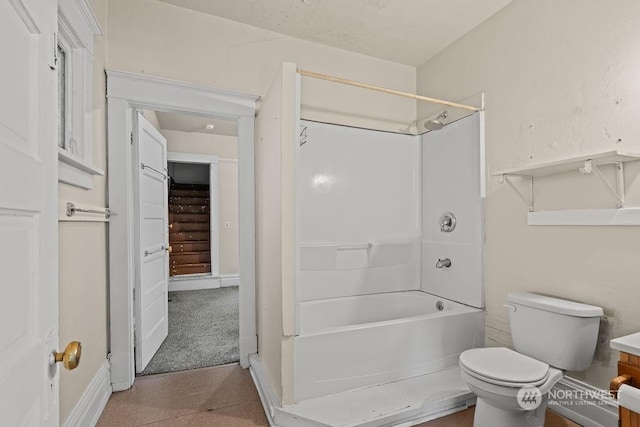 bathroom featuring toilet and shower / tub combination