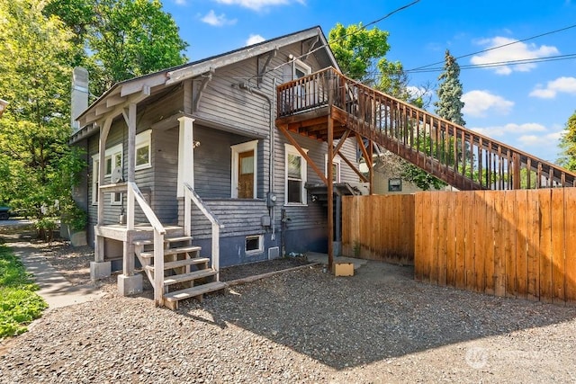 view of property exterior with a deck