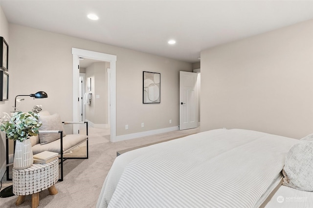 bedroom featuring light carpet