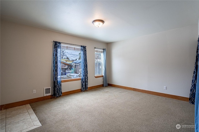 view of carpeted spare room