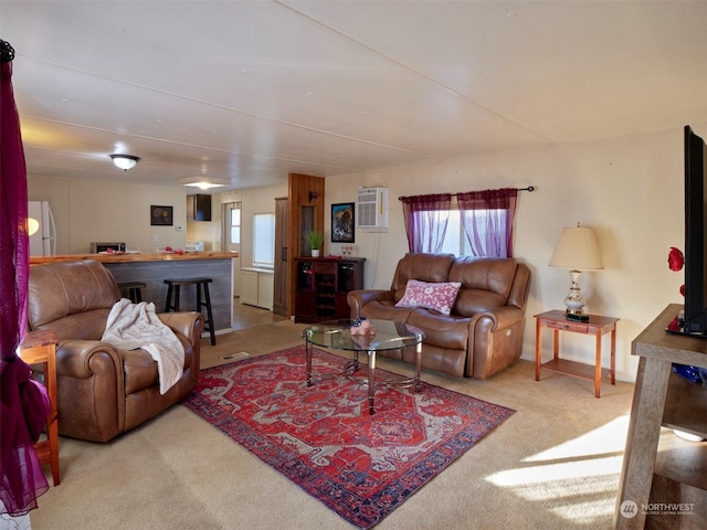 living room featuring light carpet