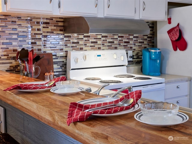 kitchen with white cabinets, decorative backsplash, ventilation hood, and white electric range