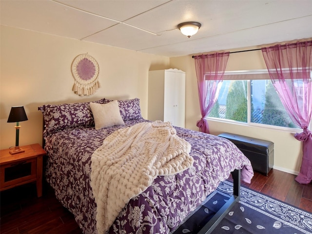 bedroom featuring dark hardwood / wood-style floors