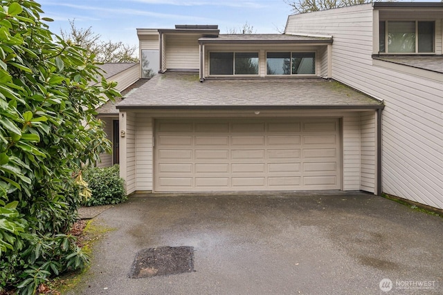 garage with driveway