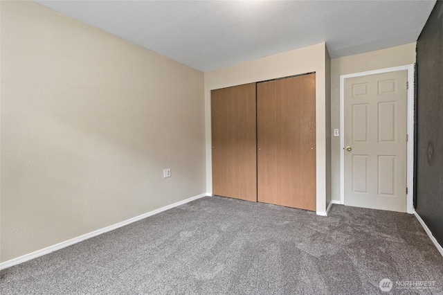 6807 345th St S, Roy, WA 98580 - unfurnished bedroom with a closet, baseboards, and carpet