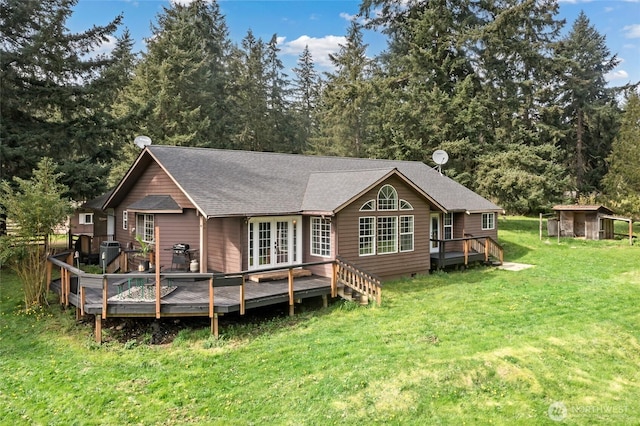 6807 345th St S, Roy, WA 98580 - rear view of property with a shingled roof, a yard, crawl space, french doors, and a wooden deck