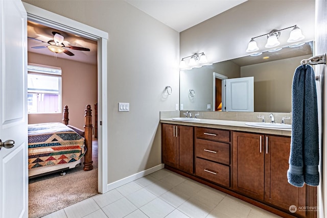 bathroom featuring vanity and ceiling fan