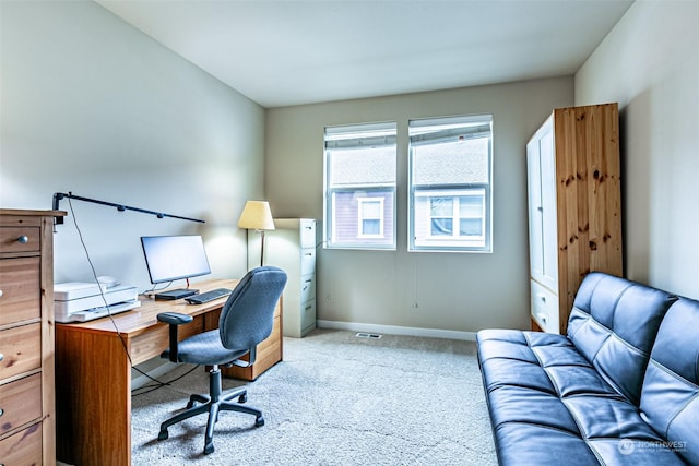 office space featuring light carpet