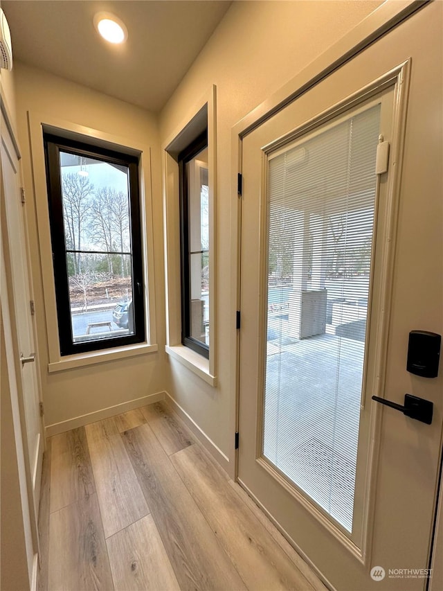 doorway featuring light hardwood / wood-style flooring