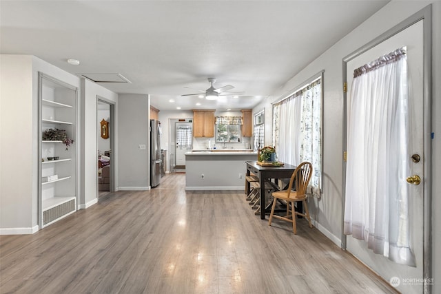 1989 NE Lisa Ln, Poulsbo, WA 98370 - living room featuring recessed lighting, a ceiling fan, light wood-type flooring, baseboards, and built in shelves