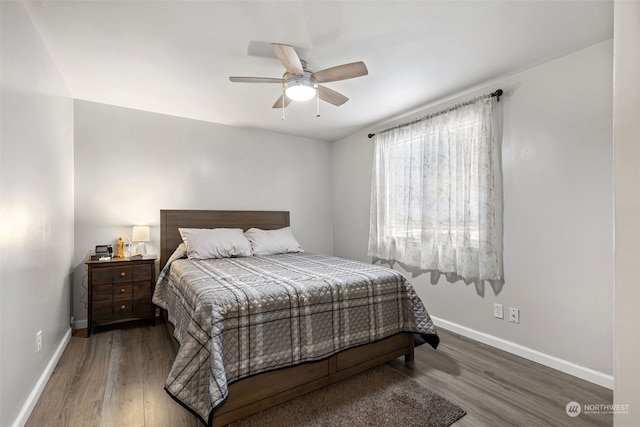 1989 NE Lisa Ln, Poulsbo, WA 98370 - bedroom featuring wood finished floors, baseboards, and ceiling fan