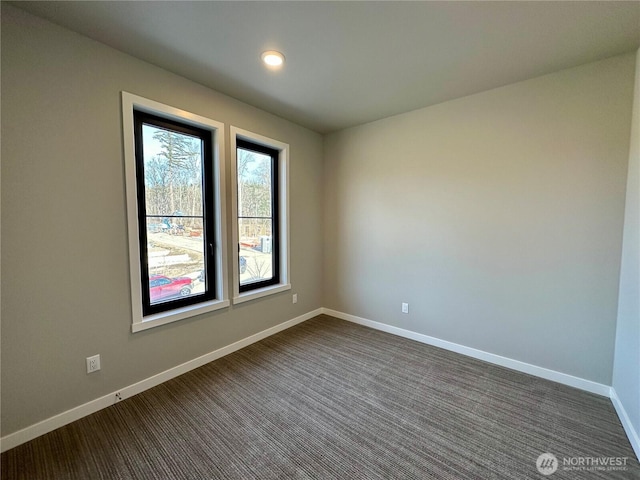 view of carpeted spare room