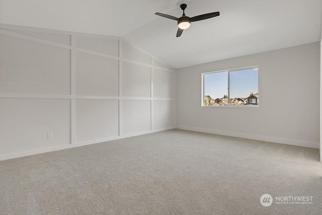 unfurnished room featuring carpet flooring, ceiling fan, and lofted ceiling