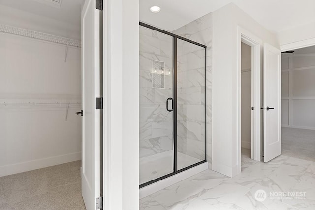 bathroom featuring an enclosed shower