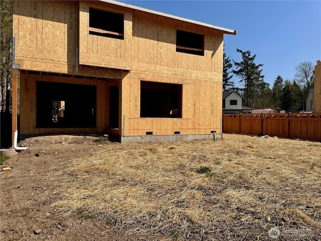 21004 67th Street Ct E, Bonney Lake, WA 98391 - rear view of house with crawl space and fence