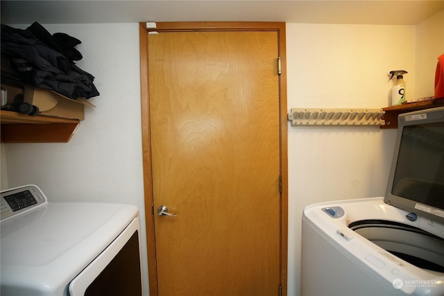 washroom featuring separate washer and dryer